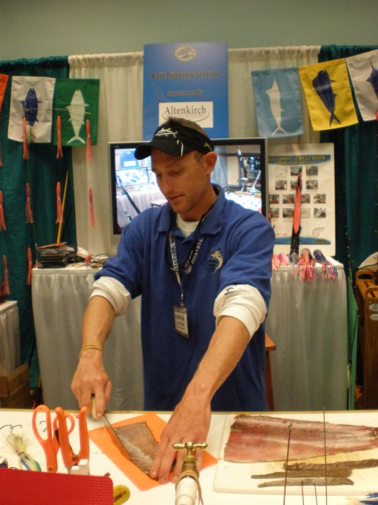 Hunter at the Miami Boat Show bait rigging station
